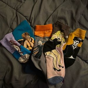 A set of five socks. Taken out of the bag and put in a drawer.